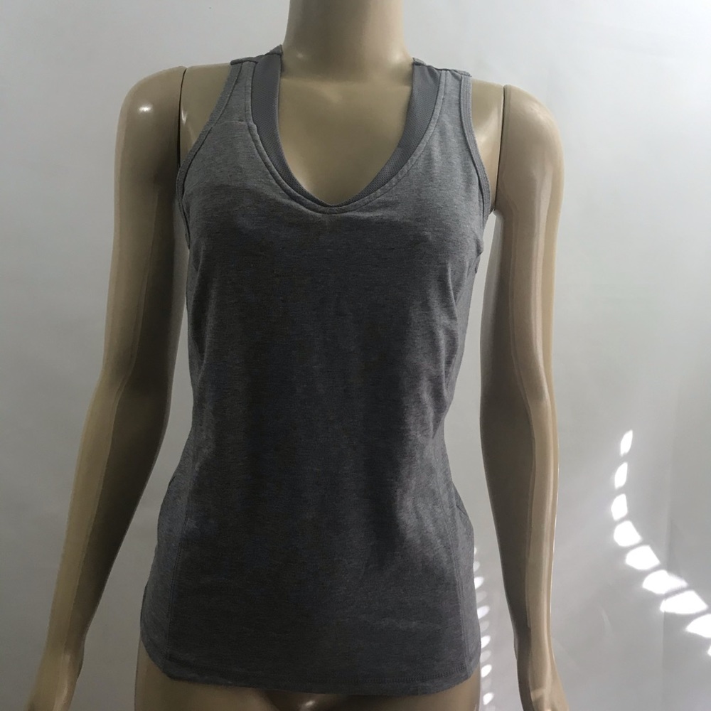 DANSKIN Women Performance fitted Tank Top .